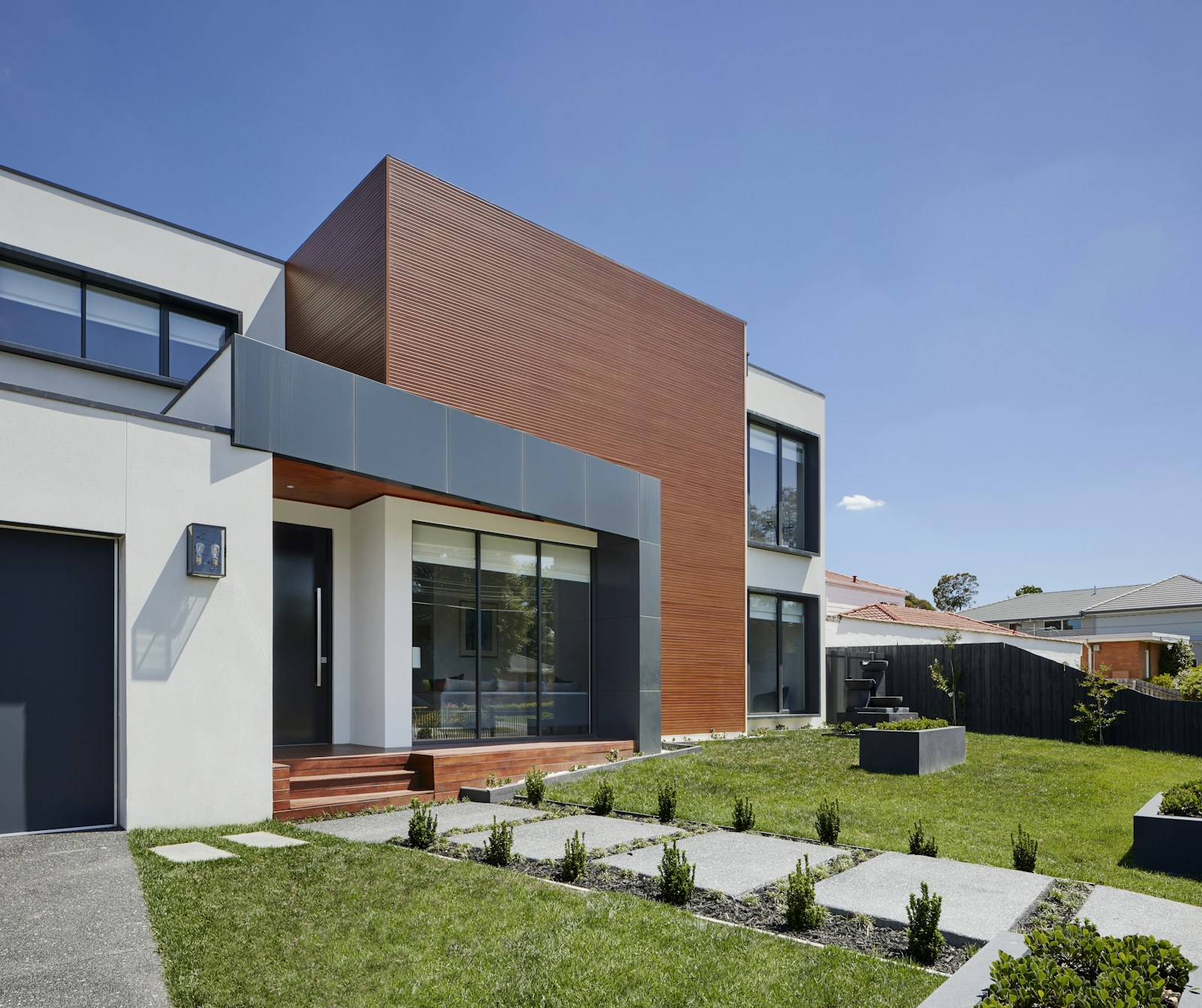 A thoughtfully maintained home surrounded by greenery